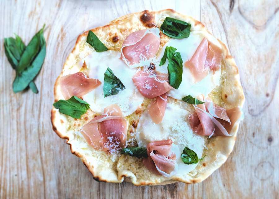 Pizza Bianca With Provolone And Prosciutto Recipe Cuisine Fiend